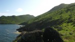 rocky slopes plunge into the ocean