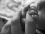 Mother and baby hands